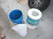Basic Waste Motor Oil Filter set up, (2) 5 gallon buckets, one with a hole in the bottom to hold the...